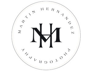 black and white logo of martin hernandez photography with overlapping M and H letters.